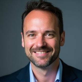 Portrait of Mark Thomas, CTO & Co-founder of RoverTrack Solutions